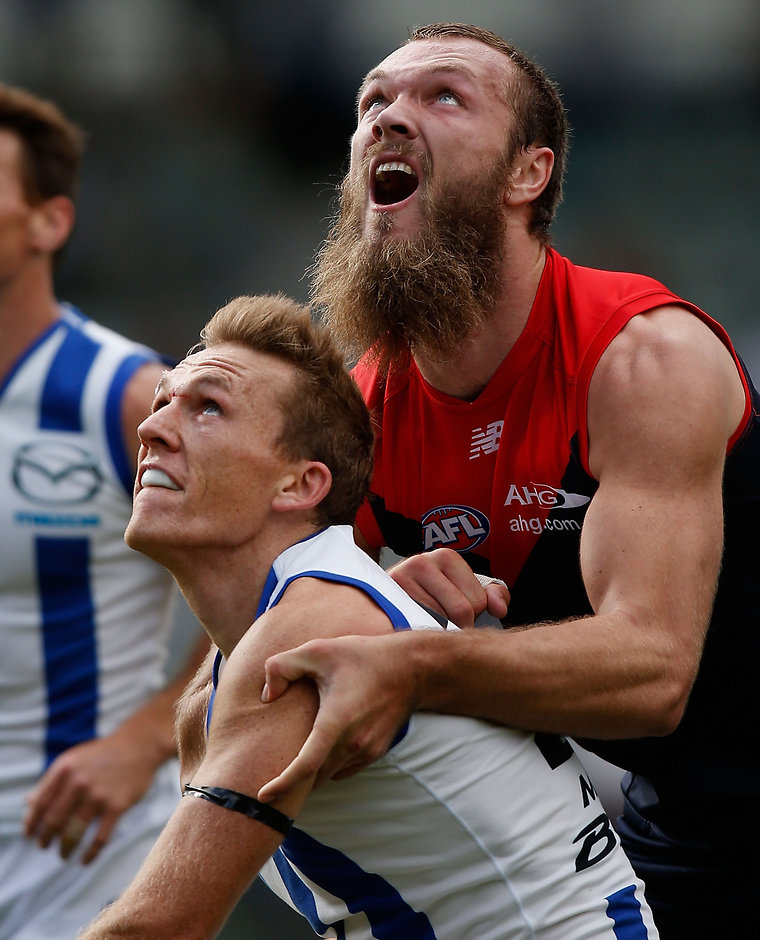 AFL 2016 Rd 03 - North Melbourne v Melbourne HOBART, AUSTRALIA - APRIL 10: Max Gawn of the Demons contests the ball against Drew Petrie of the Kangaroos during the 2016 AFL Round 03 match between the North Melbourne Kangaroos and the Melbourne Demons at Blundstone Arena, Hobart on April 10, 2016. (Photo by Sean Garnsworthy/AFL Media)